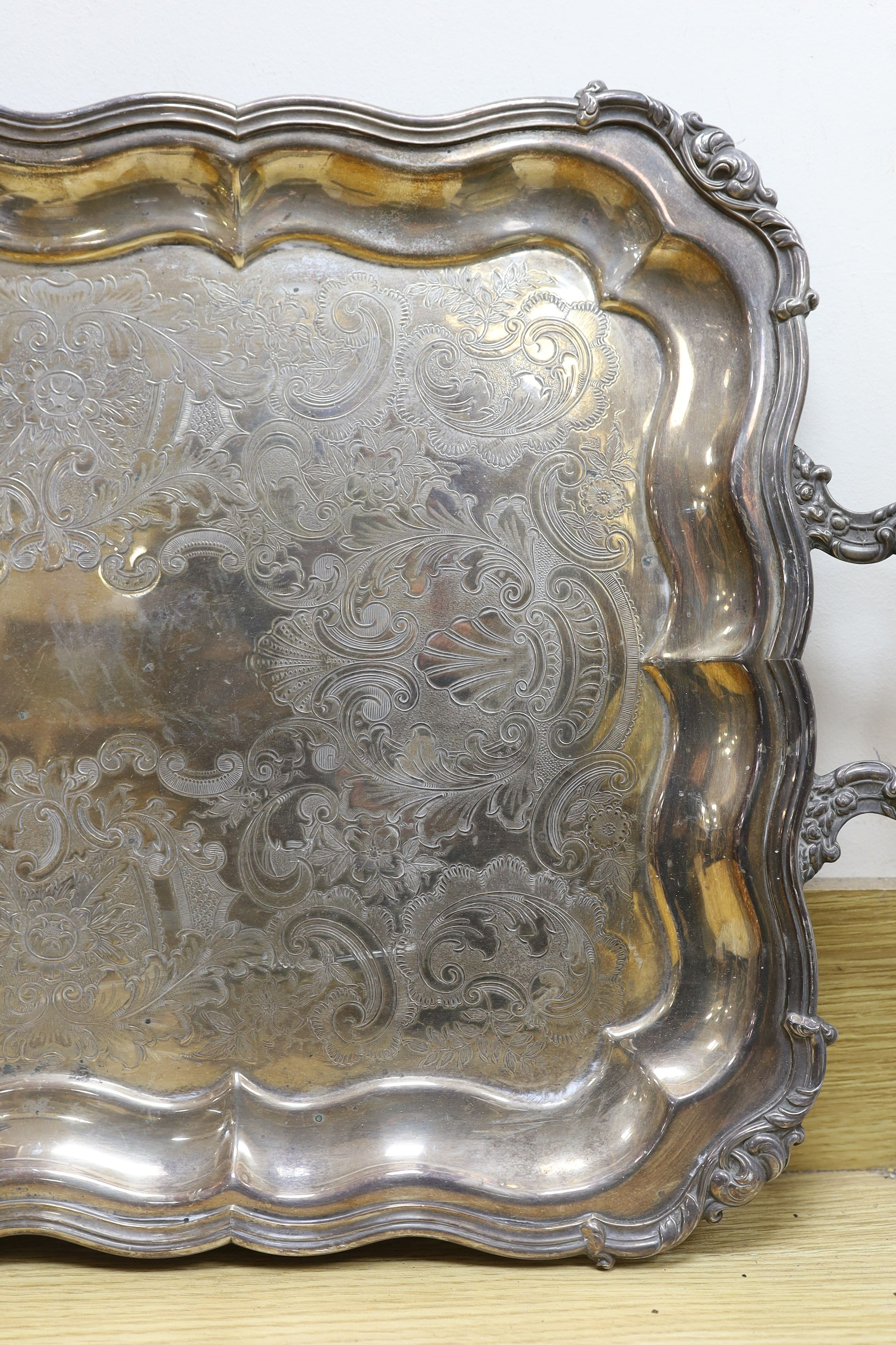 A large plated two-handled tray - 71cm long